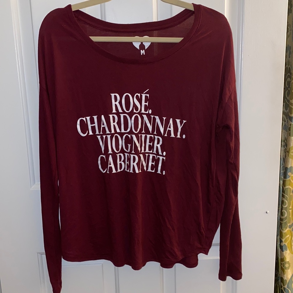 Comfy women’s maroon shirt with wine varietals listed in white. Size medium